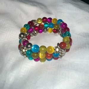 Multi color stretch band bracelet.